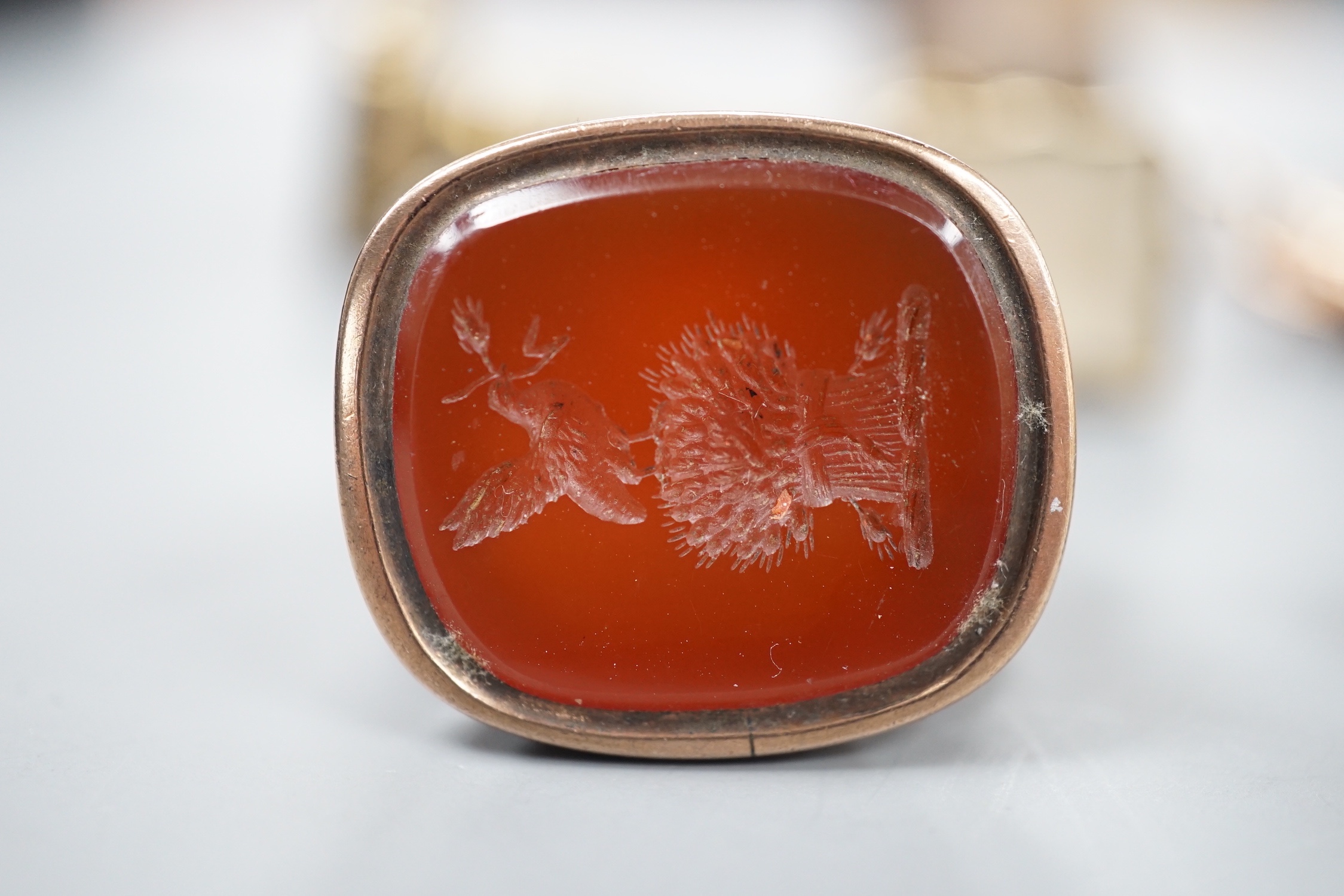 Six assorted Victorian and later mainly carnelian set fob seals including yellow metal overlaid and silver, largest 33mm.